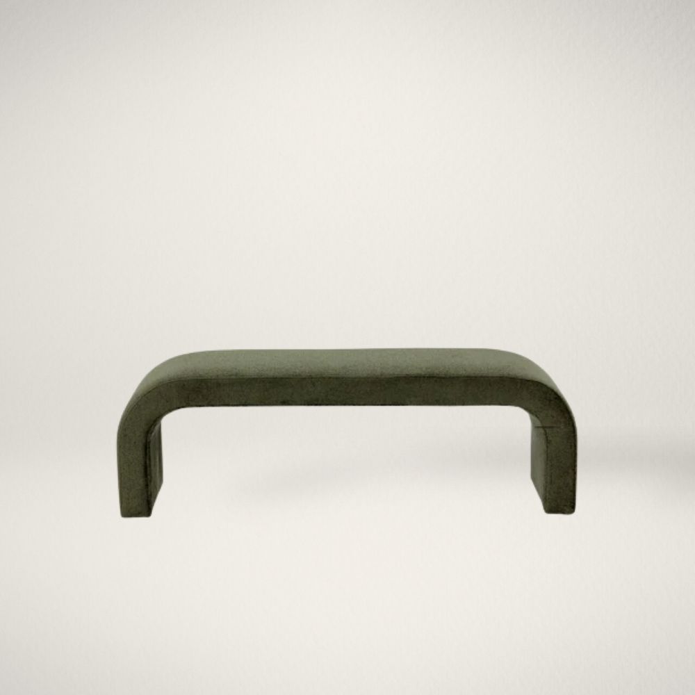 SP NAHARA - GREEN Modern curved green upholstered bench with seamless silhouette and low profile design.