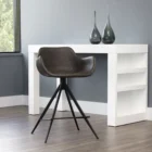 Modern swivel counter stool with black faux leather seat, curved arms, and black metal spider-leg base.