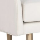 White upholstered bench with slim curved backrest and tapered gold-finished legs.