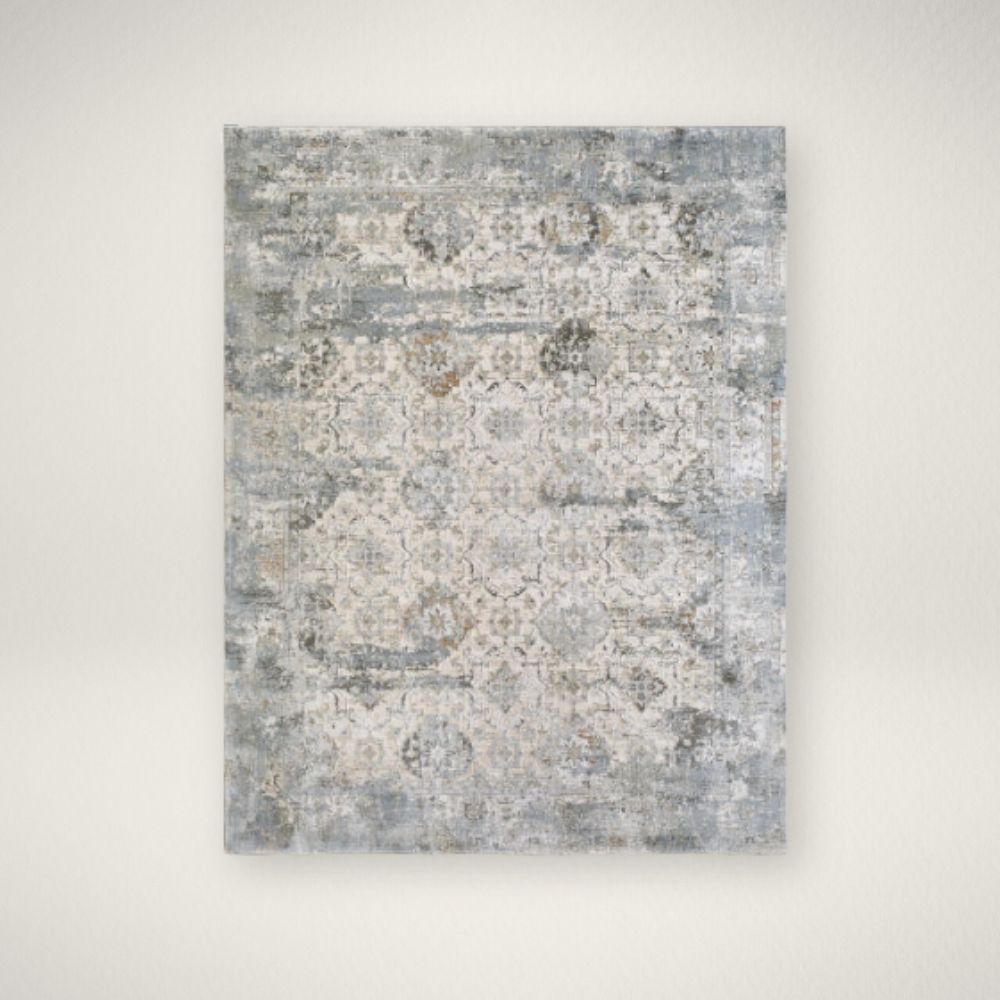 SU BRUNSWICK 2352 Traditional area rug with a distressed medallion pattern in soft grey, ivory, and muted blue tones.