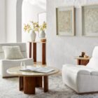 Vintage-inspired rug with a soft distressed pattern in blush, cream, and hints of blue with a classic border.