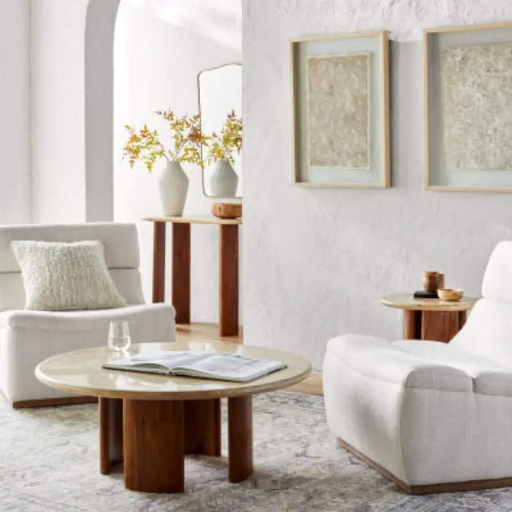 Vintage-inspired rug with a soft distressed pattern in blush, cream, and hints of blue with a classic border.