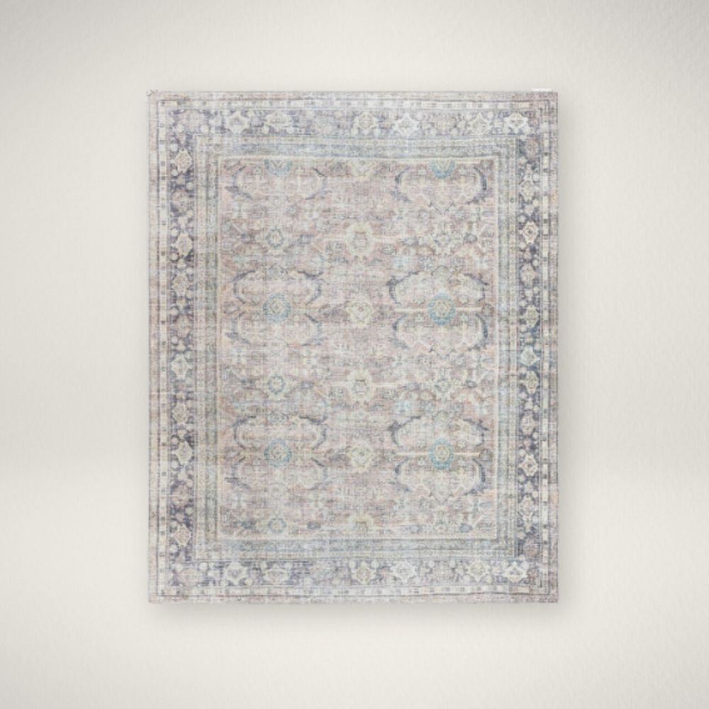 SU Darling Rug Vintage-inspired rug with a soft distressed pattern in blush, cream, and hints of blue with a classic border.