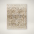 Neutral machine-woven rug in warm beige and taupe tones with a softly distressed, layered pattern.