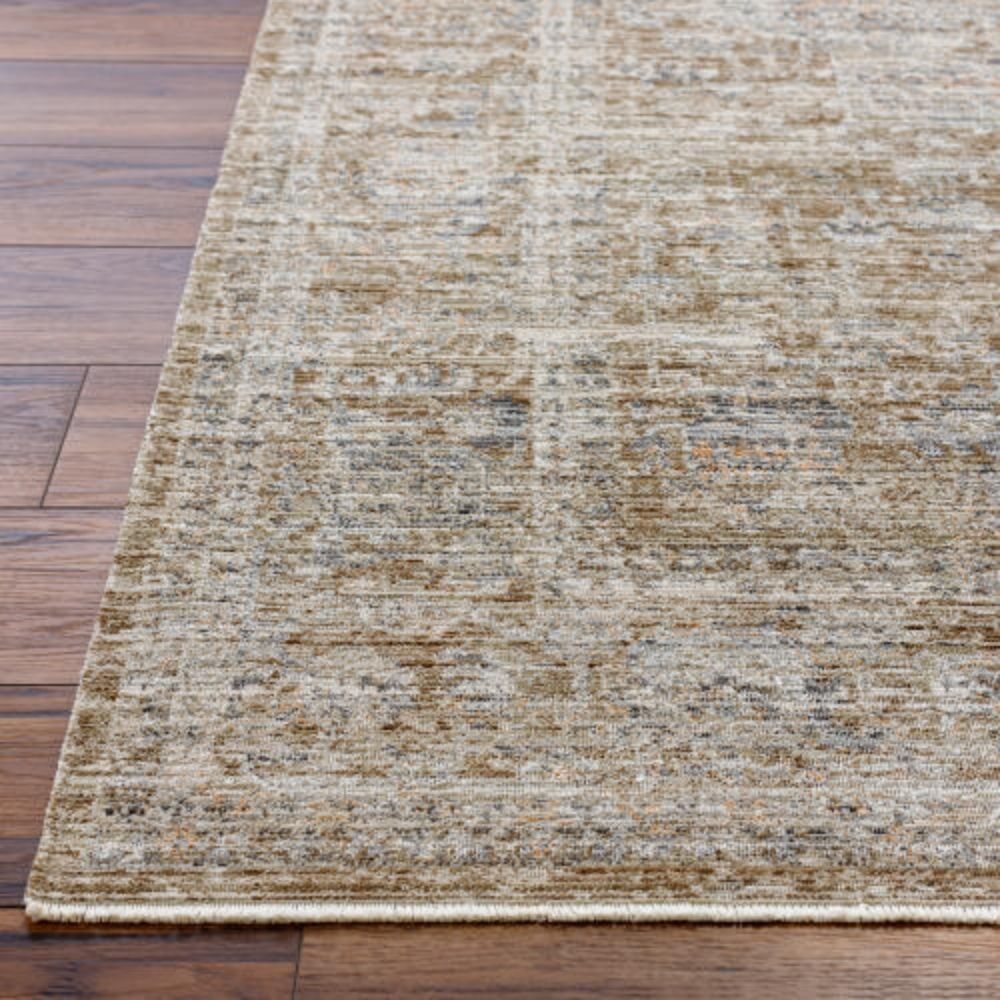 Neutral machine-woven rug in warm beige and taupe tones with a softly distressed, layered pattern.