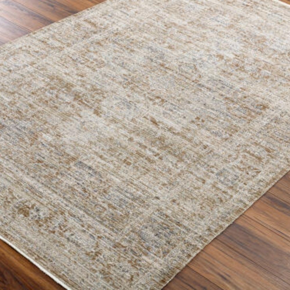 Neutral machine-woven rug in warm beige and taupe tones with a softly distressed, layered pattern.