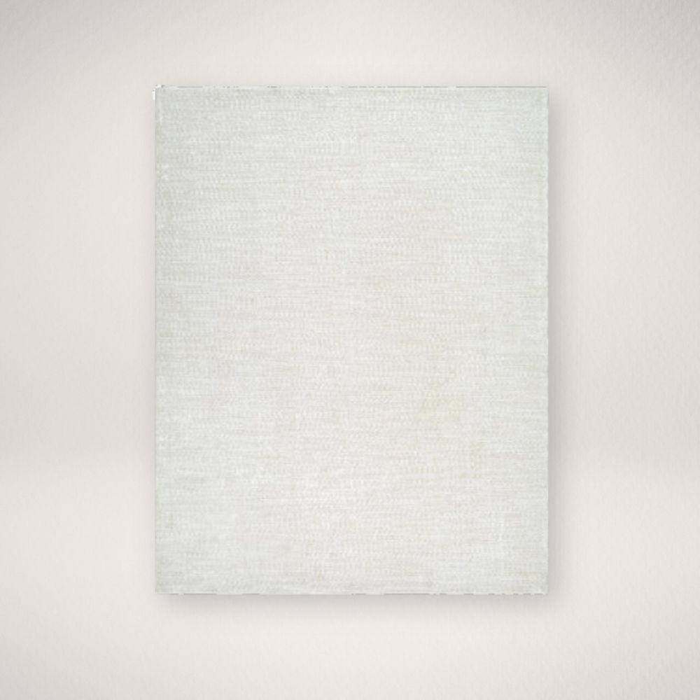 SU Masterpiece 2333 Beige and ivory machine woven rug with a soft medallion and distressed traditional pattern.