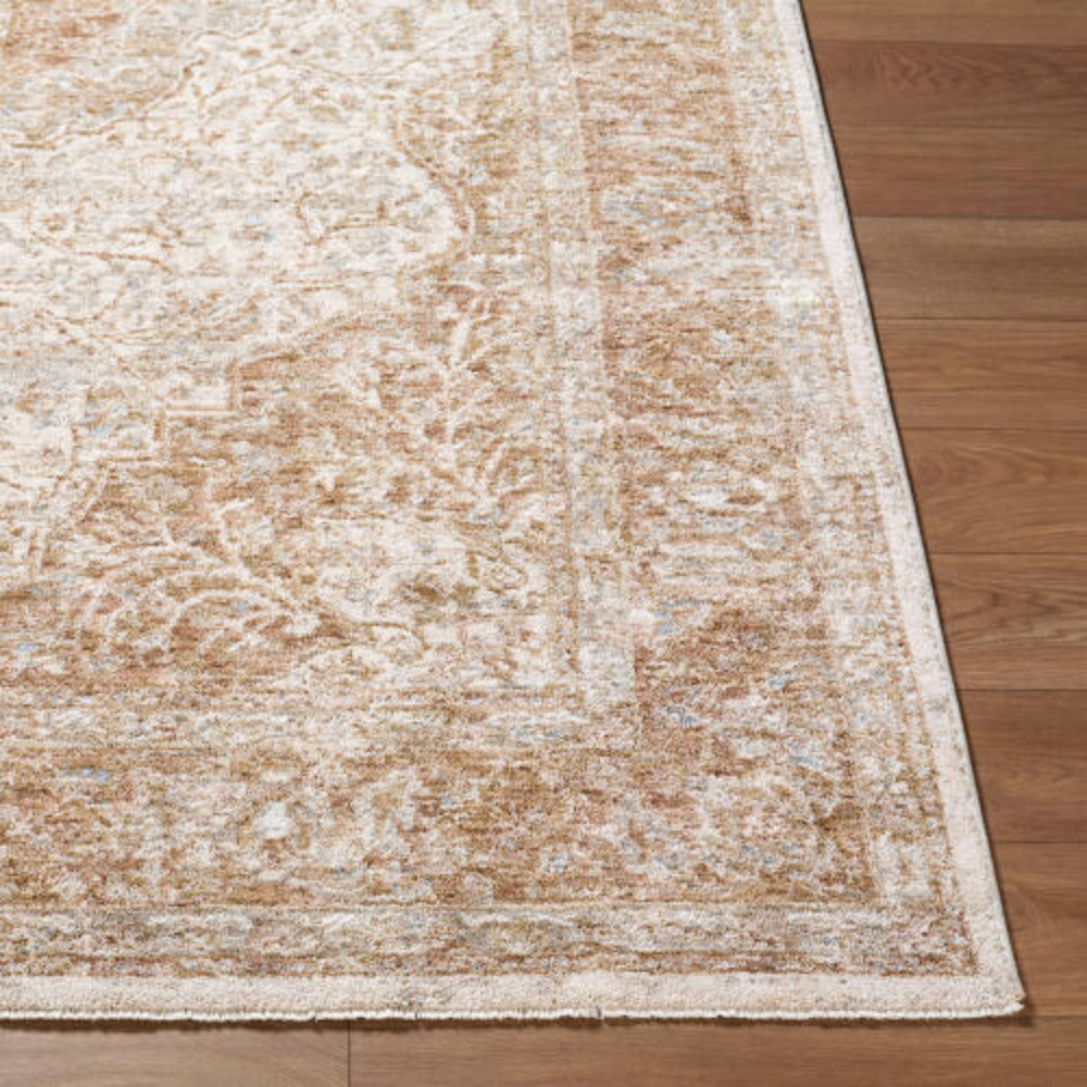 Traditional beige and ivory rug with ornate central medallion and intricate border design.