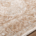 Traditional beige and ivory rug with ornate central medallion and intricate border design.