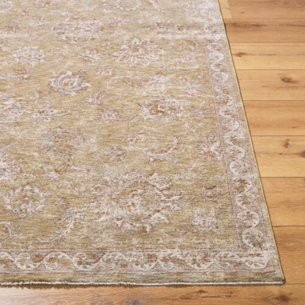 Traditional machine woven rug with ornate medallion and border design in warm beige and ivory tones.