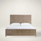 A rustic modern panel bed with a woven wood lattice headboard and a solid wood footboard in a natural weathered finish.
