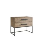 A modern nightstand in a light natural wood finish with two drawers, oversized black metal handles, and an open metal base frame.