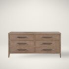 A six-drawer dresser in a light natural wood finish with long horizontal metal handles and tapered legs.