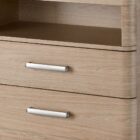 A modern nightstand in a light natural wood finish with two drawers, a sleek silver handle design, and an open storage shelf.