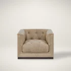 Square tufted leather swivel chair with deep seat and modern silhouette.