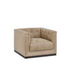 Square tufted leather swivel chair with deep seat and modern silhouette.