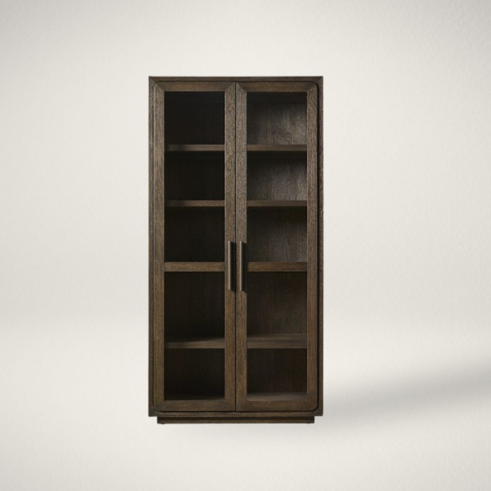 UN SABLE CABINET Dark wood storage cabinet with glass-front double doors and interior shelving.