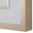 Set of nine framed botanical prints featuring colorful floral illustrations with green leaves and stems on white backgrounds, each in a light wood frame.