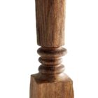 Tall handcrafted wooden sculpture with natural grain and geometric carved detailing.