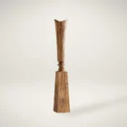 Tall handcrafted wooden sculpture with natural grain and geometric carved detailing.