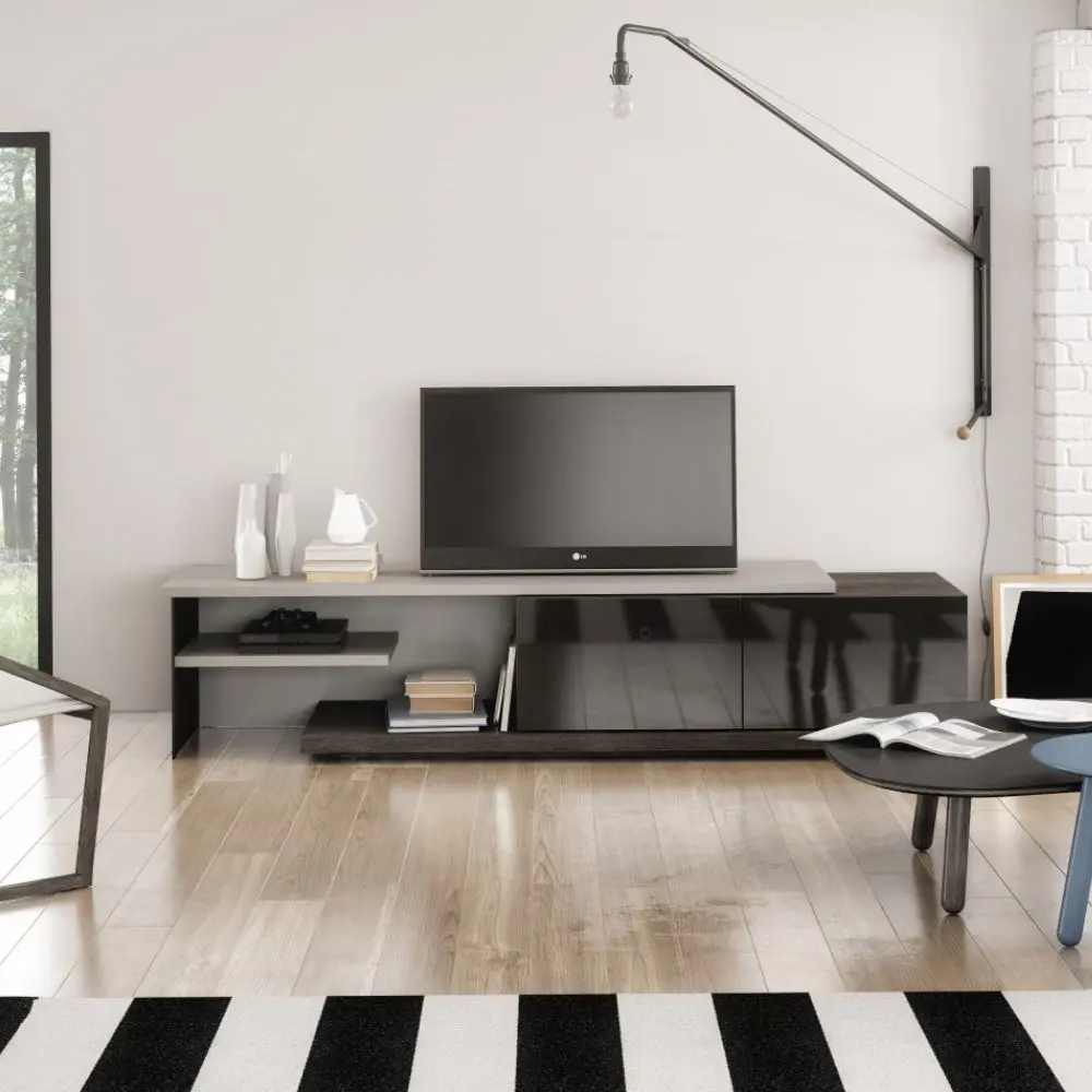 Huppé Inverse modern media stand in two-tone wood and lacquer finish with asymmetrical shelving and concealed storage.