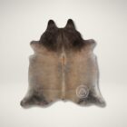 Natural grey-beige cowhide rug featuring soft neutral tones and organic shape.