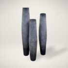 Set of three tall grey sculptural vases with ombré finish and elongated silhouettes.