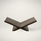Renwil Ocra wooden magazine holder with a modern X-shaped design in a dark finish.