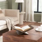 Renwil Ocra wooden magazine holder with a modern X-shaped design in a dark finish.
