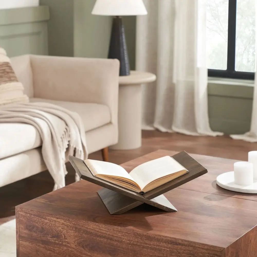 Renwil Ocra wooden magazine holder with a modern X-shaped design in a dark finish.
