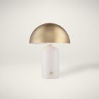Renwil Solero table lamp with a white cylindrical base and a dome-shaped brushed brass shade.