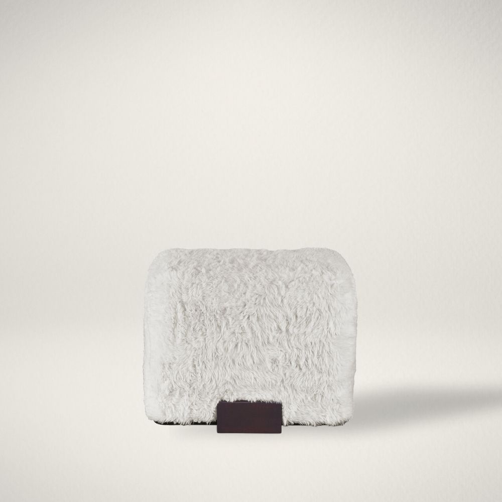 RN WILSHIRE Renwil Wilshire ottoman with faux fur upholstery and dark block base