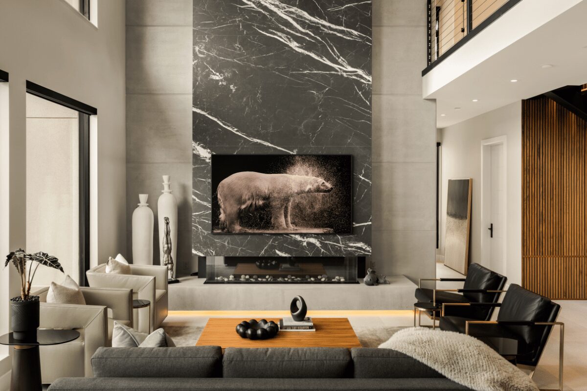 Living room under construction showing large marble fireplace slab installation at the Modern Manor on Lake St Clair