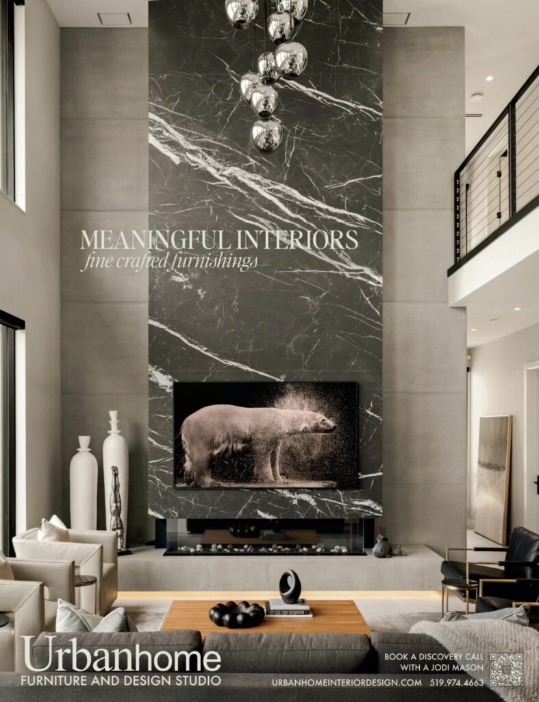 Urbanhome Interior Design Meaningful Interiors Ad – Modern Manor on Lake St Clair Modern luxury living room with dramatic marble fireplace wall designed by Urbanhome Interior Design in Windsor Ontario