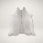 Natural grey cowhide rug with soft tonal variations and organic shape.