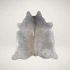 Luxury grey cowhide rug with natural organic shape and soft tonal variations in grey and taupe
