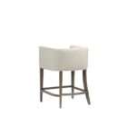 Upholstered bar stool with a cream cushioned seat and rounded arm detail, supported by a dark wood frame with footrest.