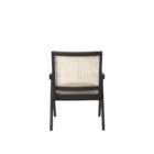 Modern black wood accent chair with woven cane back and neutral upholstered seat.