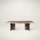 Rectangular wood dining table with a natural live-edge inspired top and solid panel base legs in a warm medium wood finish.