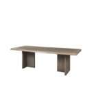 Rectangular wood dining table with a natural live-edge inspired top and solid panel base legs in a warm medium wood finish.