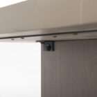 Rectangular wood dining table with a natural live-edge inspired top and solid panel base legs in a warm medium wood finish.