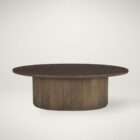 Round wood coffee table with a smooth top and a fluted cylindrical base in a warm medium wood finish.
