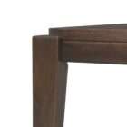 Rectangular wood dining table with a clean top and tapered legs in a warm medium-dark finish.