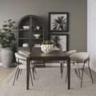 Rectangular wood dining table with a clean top and tapered legs in a warm medium-dark finish.