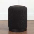 Renwil Castillo ottoman in dark textured upholstery with cylindrical shape and black base