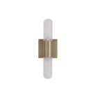 Modern wall sconce with brass backplate and vertical ribbed glass light tubes creating a soft ambient glow.