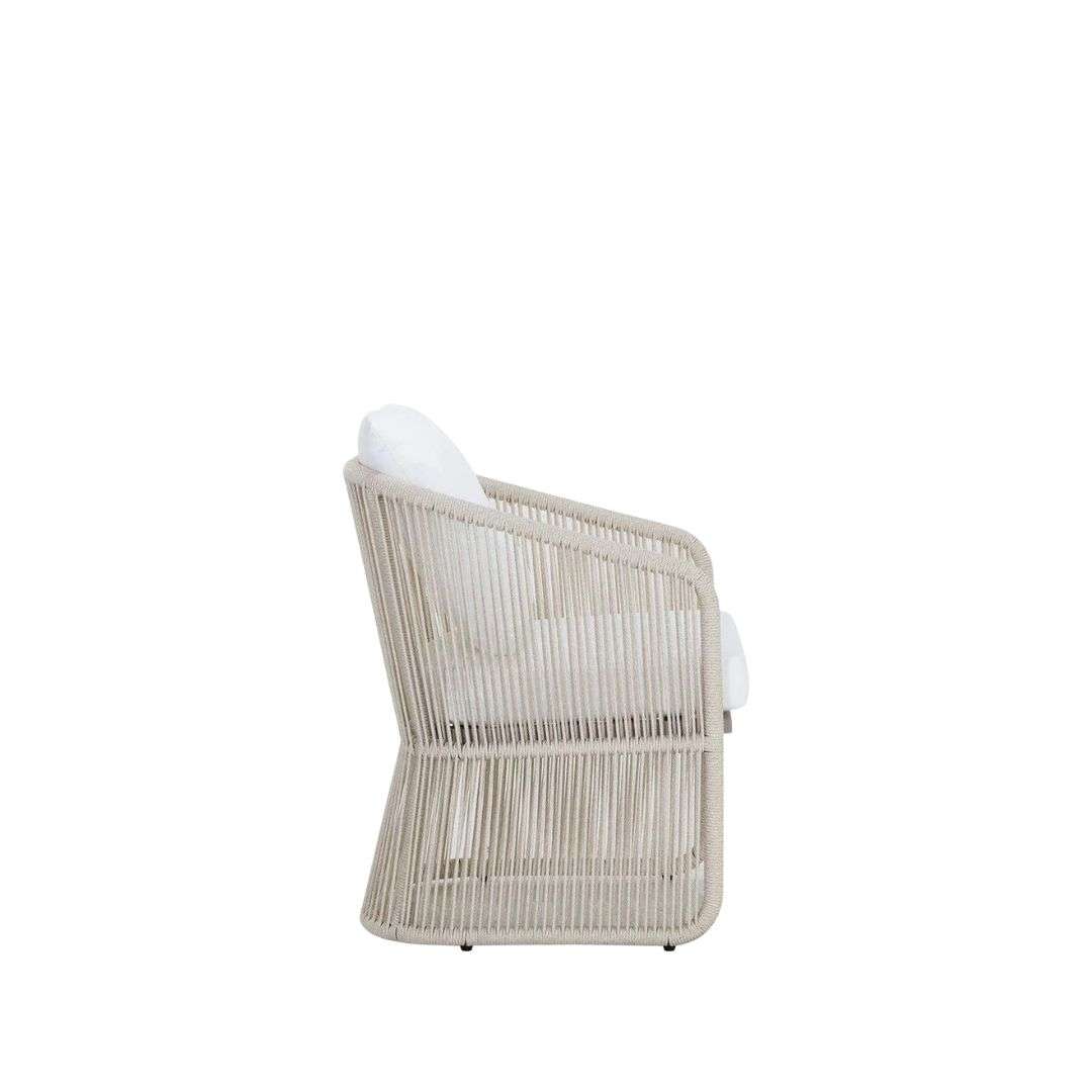 Outdoor lounge chair with woven rope sides in a soft neutral tone, featuring a light frame and plush white seat and back cushions.