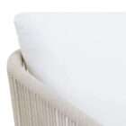 Outdoor lounge chair with woven rope sides in a soft neutral tone, featuring a light frame and plush white seat and back cushions.