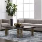 Rectangular dark wood coffee table with sculptural brushed metal rod legs.
