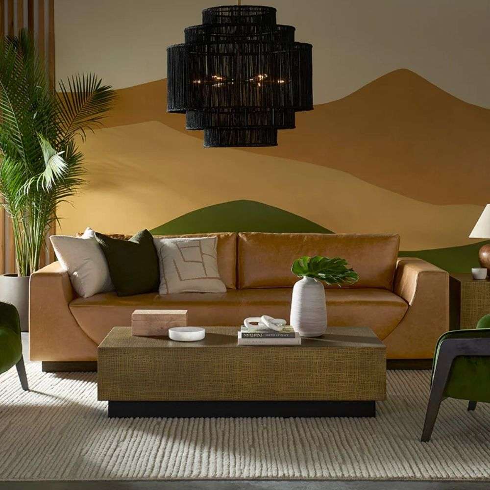 Handcrafted by skilled artisans in India. Unique imperfections such as fissures, markings, and variations in colour and shape are appreciated characteristics of a truly one-of-a-kind piece. Black jute is handwoven across an antique brass iron frame. Each tier features a hand-braided design.